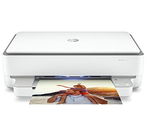 HP Envy 6030 printer printing a color photo, showcasing its multifunctional inkjet capabilities for home and office use.