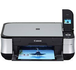 Canon PIXMA MP540 multifunction inkjet printer with 2.0-inch color display, printing a photo, supports borderless printing.
