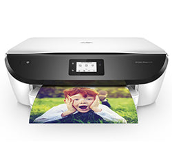 HP Envy Photo 6234 inkjet printer printing a colorful photo, ideal for high-quality home photo and document printing.