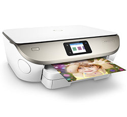 HP Envy Photo 7134 printer displaying a printed photo, featuring sleek design and touchscreen interface.
